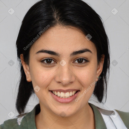 Joyful latino young-adult female with medium  brown hair and brown eyes