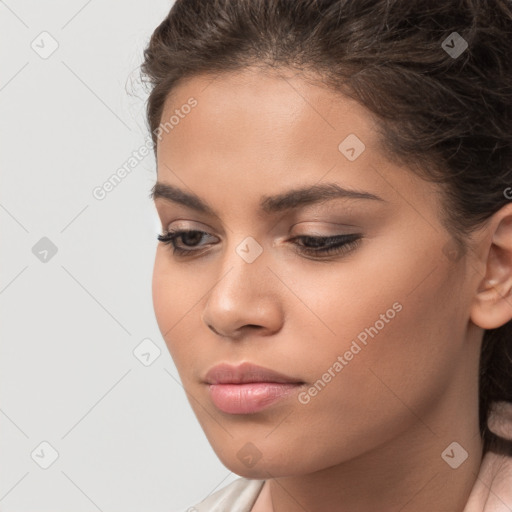 Neutral white young-adult female with long  brown hair and brown eyes