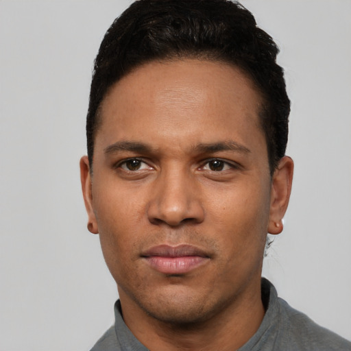 Neutral white young-adult male with short  black hair and brown eyes