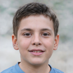 Joyful white child male with short  brown hair and brown eyes