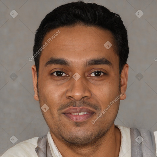 Joyful latino young-adult male with short  black hair and brown eyes