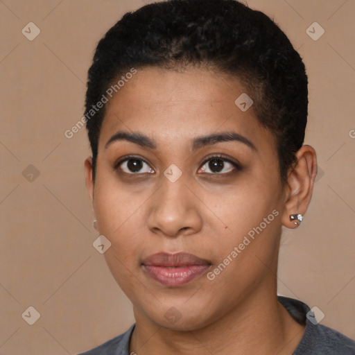 Joyful black young-adult female with short  brown hair and brown eyes