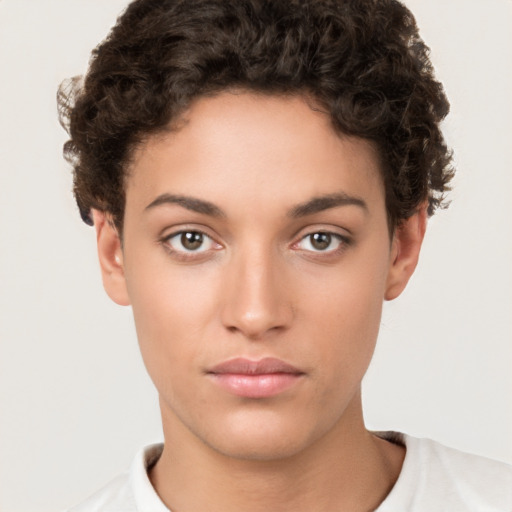 Neutral white young-adult female with short  brown hair and brown eyes