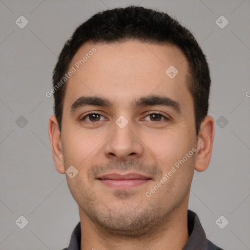 Joyful white young-adult male with short  brown hair and brown eyes