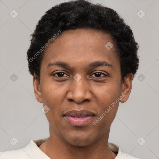 Joyful black adult male with short  black hair and brown eyes