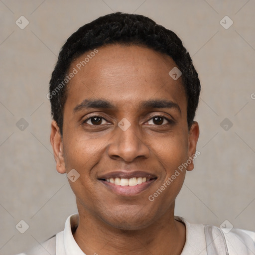 Joyful black young-adult male with short  black hair and brown eyes