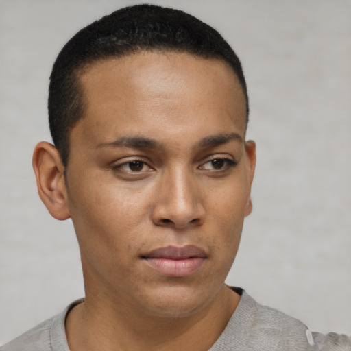 Neutral latino young-adult male with short  brown hair and brown eyes