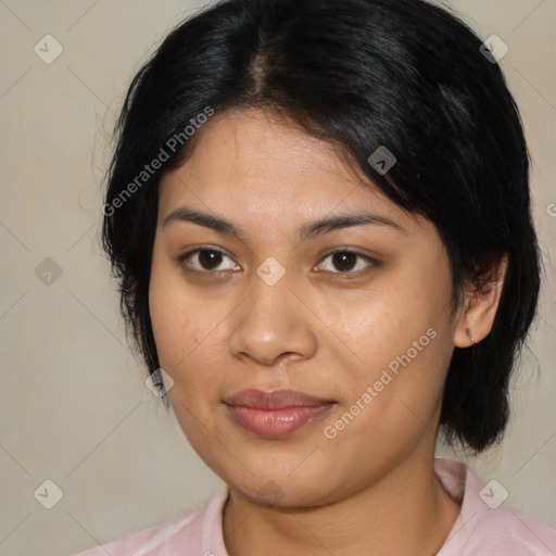 Joyful latino young-adult female with medium  brown hair and brown eyes