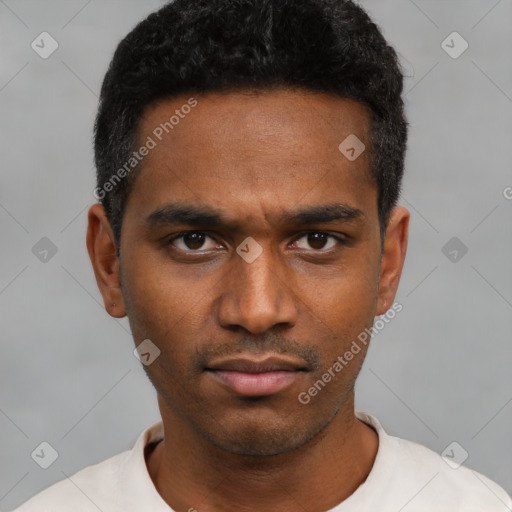 Neutral latino young-adult male with short  black hair and brown eyes
