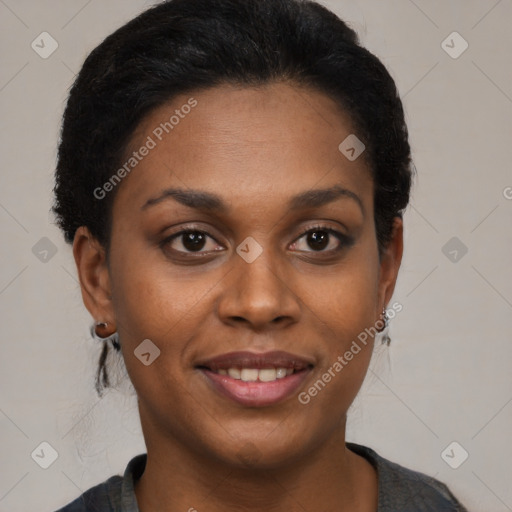 Joyful black young-adult female with short  black hair and brown eyes