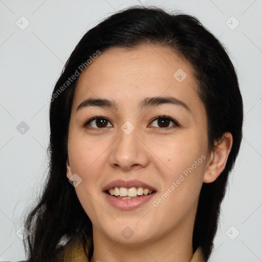 Joyful latino young-adult female with medium  black hair and brown eyes