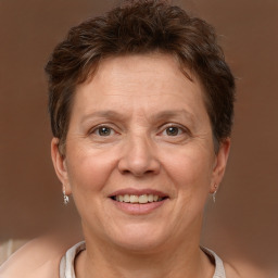 Joyful white adult female with short  brown hair and brown eyes