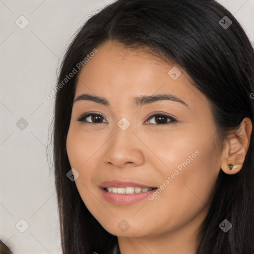 Joyful latino young-adult female with long  brown hair and brown eyes