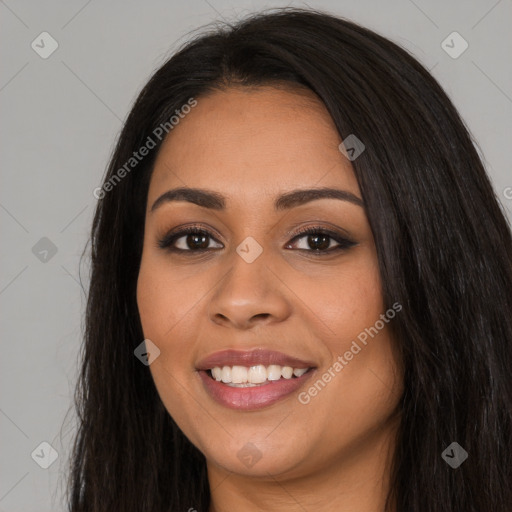 Joyful latino young-adult female with long  black hair and brown eyes