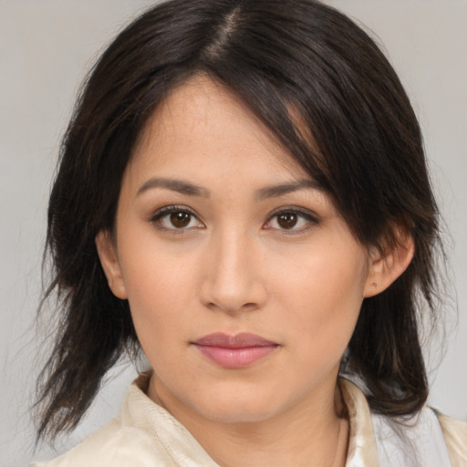 Neutral white young-adult female with medium  brown hair and brown eyes