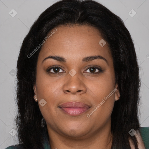 Joyful black young-adult female with long  brown hair and brown eyes