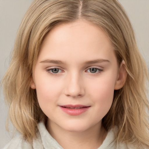 Joyful white child female with medium  brown hair and grey eyes