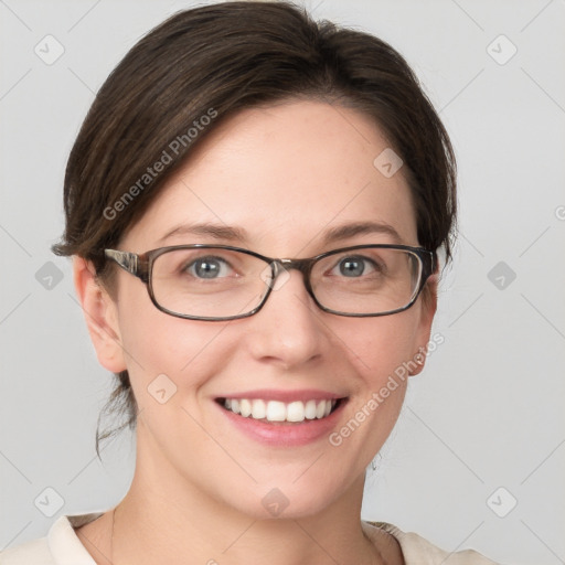 Joyful white young-adult female with medium  brown hair and blue eyes