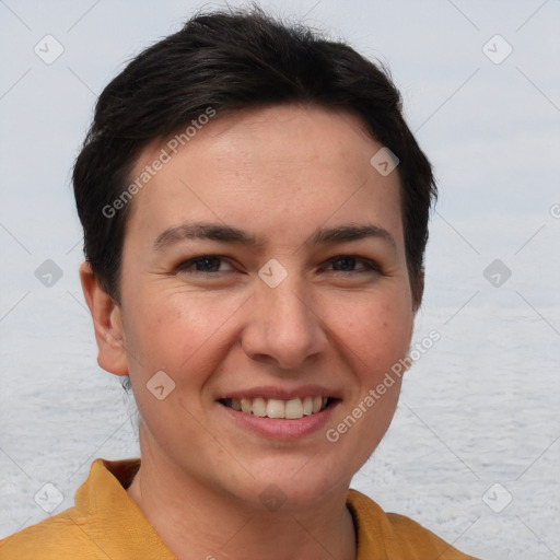 Joyful white young-adult female with short  brown hair and brown eyes