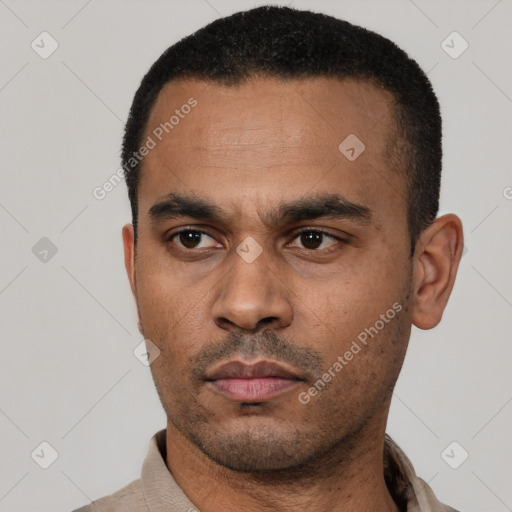 Neutral latino young-adult male with short  black hair and brown eyes