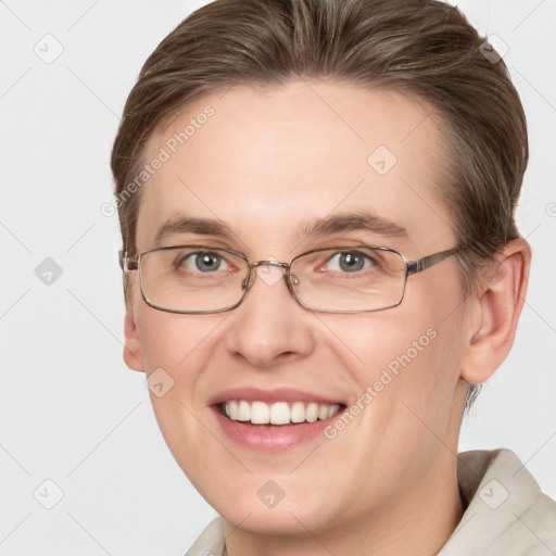 Joyful white young-adult female with short  brown hair and grey eyes