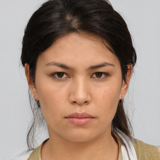 Neutral asian young-adult female with medium  brown hair and brown eyes