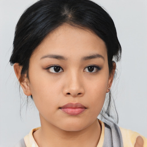 Neutral asian young-adult female with medium  black hair and brown eyes