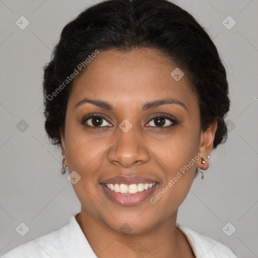 Joyful black young-adult female with medium  brown hair and brown eyes