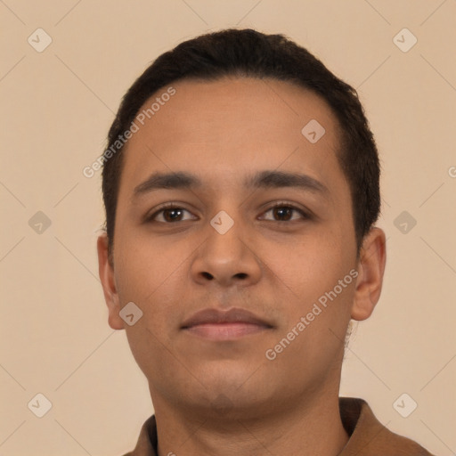 Neutral latino young-adult male with short  black hair and brown eyes