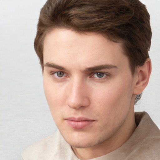 Neutral white young-adult male with short  brown hair and grey eyes