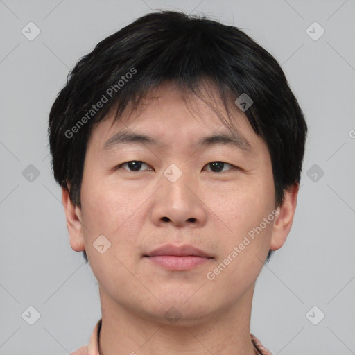 Neutral asian young-adult male with short  brown hair and brown eyes