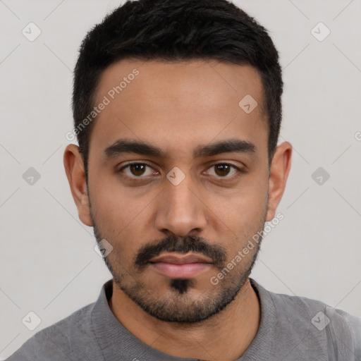 Neutral latino young-adult male with short  black hair and brown eyes