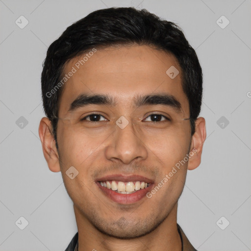 Joyful latino young-adult male with short  black hair and brown eyes