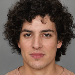 Joyful white young-adult male with medium  brown hair and brown eyes