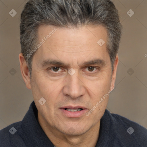 Joyful white middle-aged male with short  brown hair and brown eyes