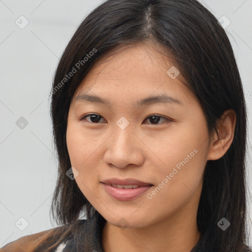 Joyful asian young-adult female with long  brown hair and brown eyes