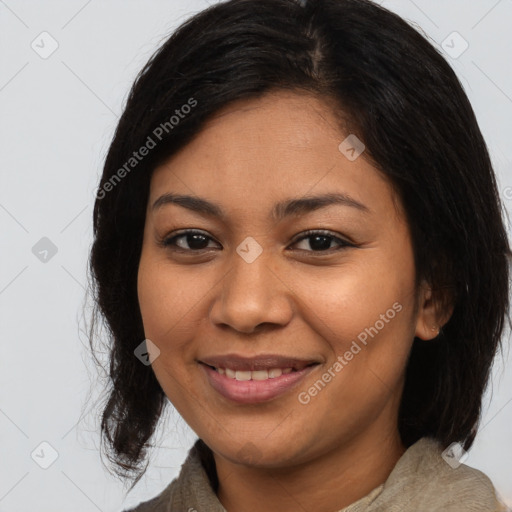 Joyful latino young-adult female with medium  brown hair and brown eyes