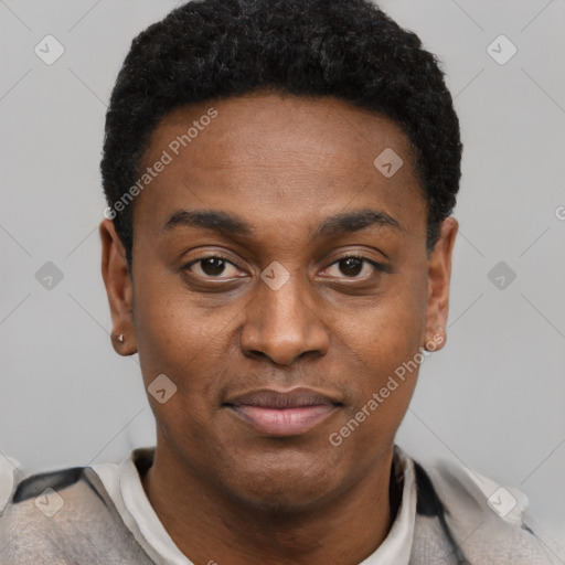 Joyful black young-adult male with short  black hair and brown eyes