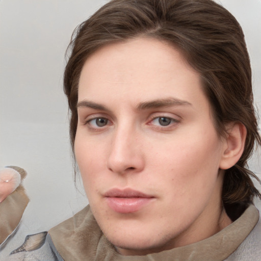 Neutral white young-adult female with medium  brown hair and grey eyes