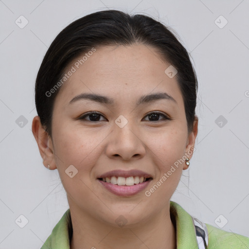 Joyful asian young-adult female with short  brown hair and brown eyes