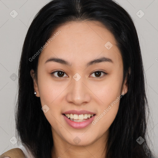 Joyful asian young-adult female with long  brown hair and brown eyes