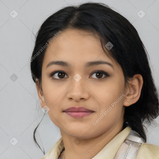 Joyful asian young-adult female with medium  black hair and brown eyes