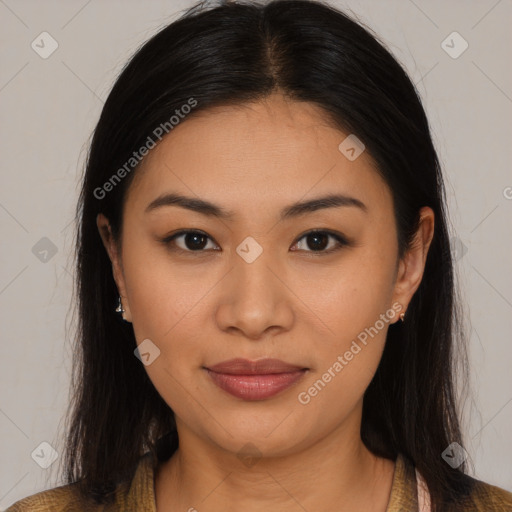 Joyful asian young-adult female with long  brown hair and brown eyes