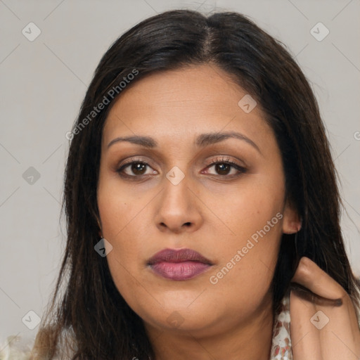 Neutral white young-adult female with long  brown hair and brown eyes