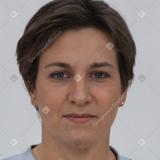 Joyful white adult female with short  brown hair and brown eyes