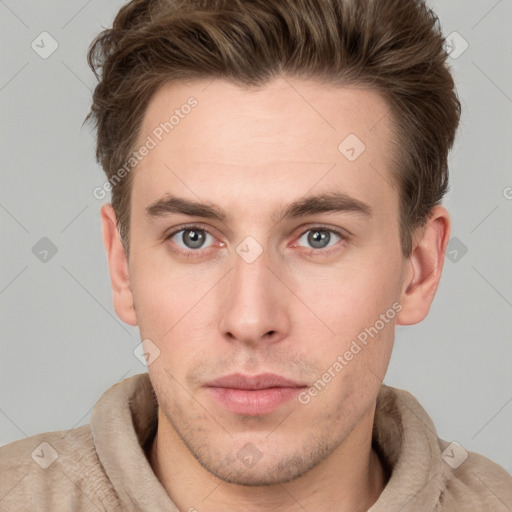 Neutral white young-adult male with short  brown hair and grey eyes