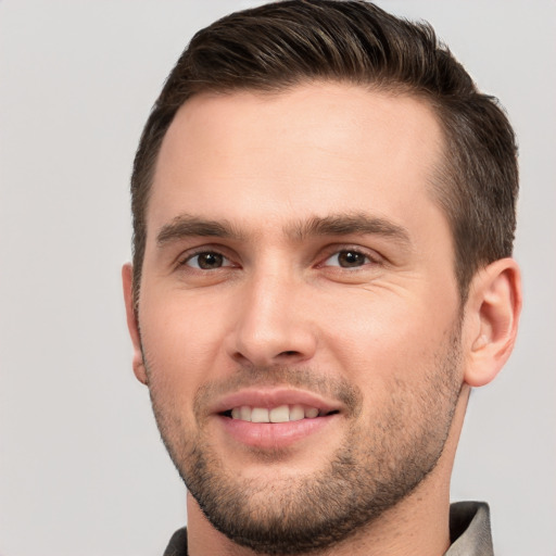 Joyful white young-adult male with short  brown hair and brown eyes