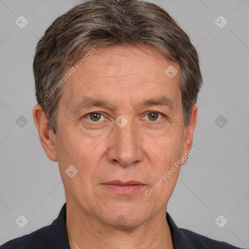 Neutral white middle-aged male with short  brown hair and brown eyes