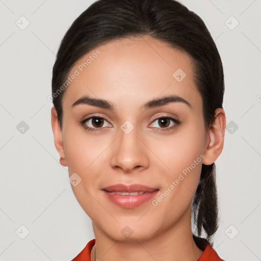 Joyful white young-adult female with long  brown hair and brown eyes