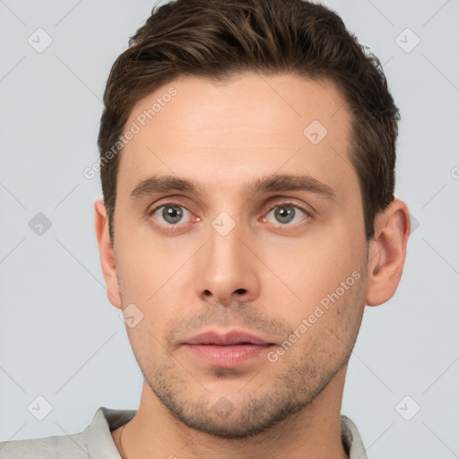 Neutral white young-adult male with short  brown hair and brown eyes